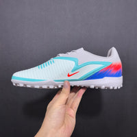 Chuteira Nike Phantom ReactX 6 ProSociety TF
