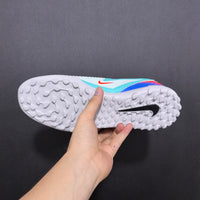 Chuteira Nike Phantom ReactX 6 ProSociety TF