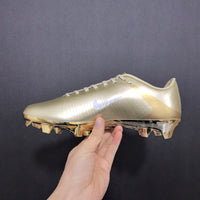 Chuteira Nike Mercurial CR7 dourada