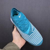 Chuteira Nike Phantom ReactX 6 Elite Society TF