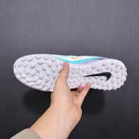 Chuteira Nike Phantom ReactX 6 ProSociety TF