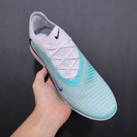Chuteira Nike Phantom ReactX 6 ProSociety TF