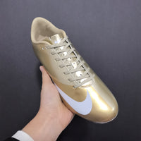 Chuteira Nike Mercurial CR7 dourada