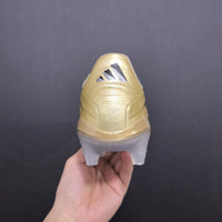 Chuteira Adidas Copa dourada