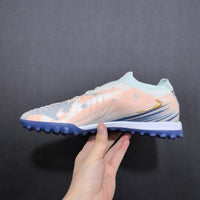 Chuteira Nike Phantom GX 2 Elite Society TF