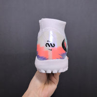 Chuteira Nike Phantom ReactX 6 Pro Botinha Society