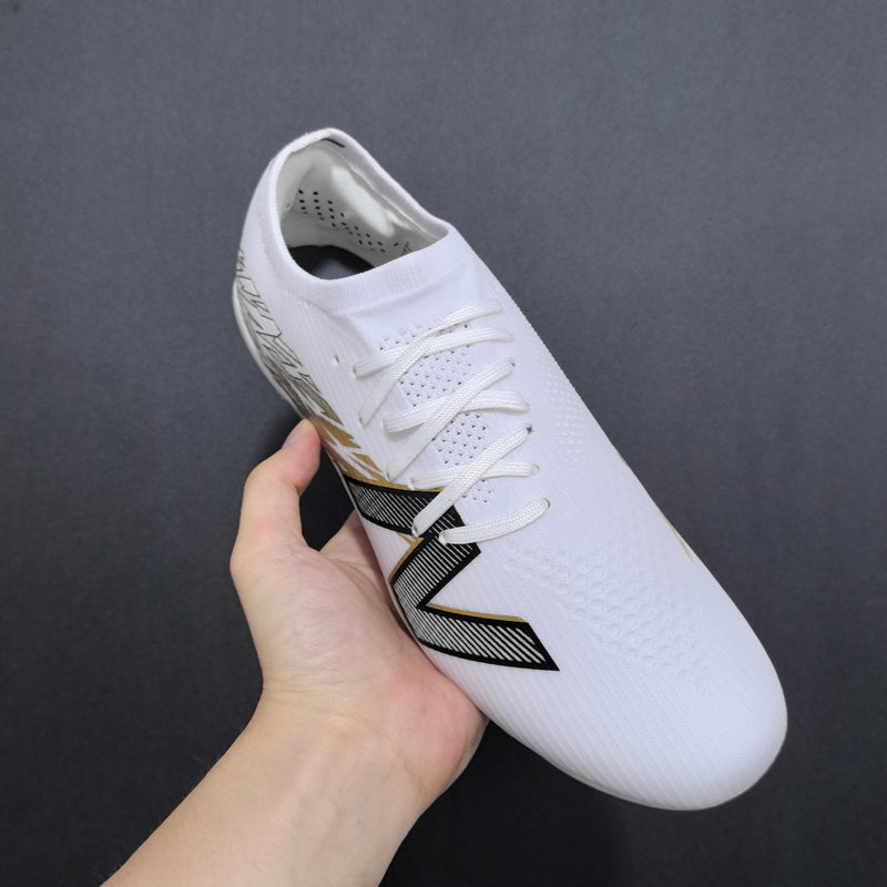 Chuteira New Balance Furon V8 Elite HG