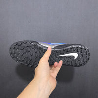 Chuteira Nike Phantom GX 2 Elite Society TF